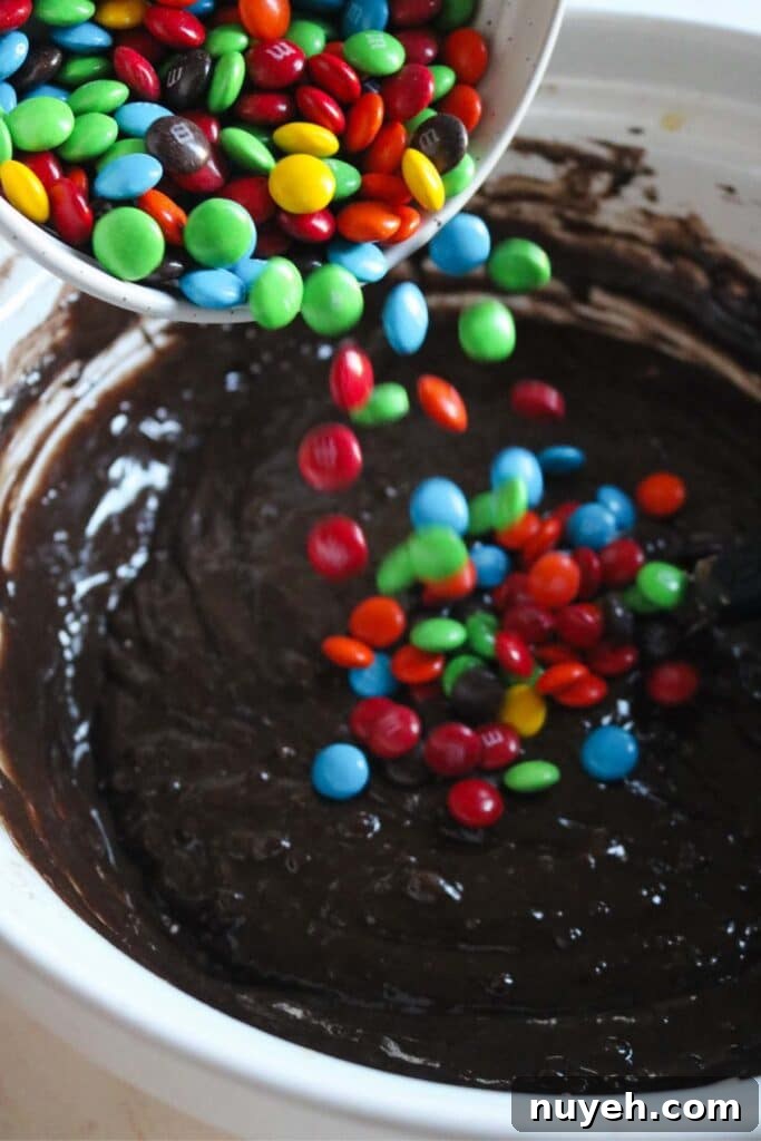 brownie batter with m&ms before baking.