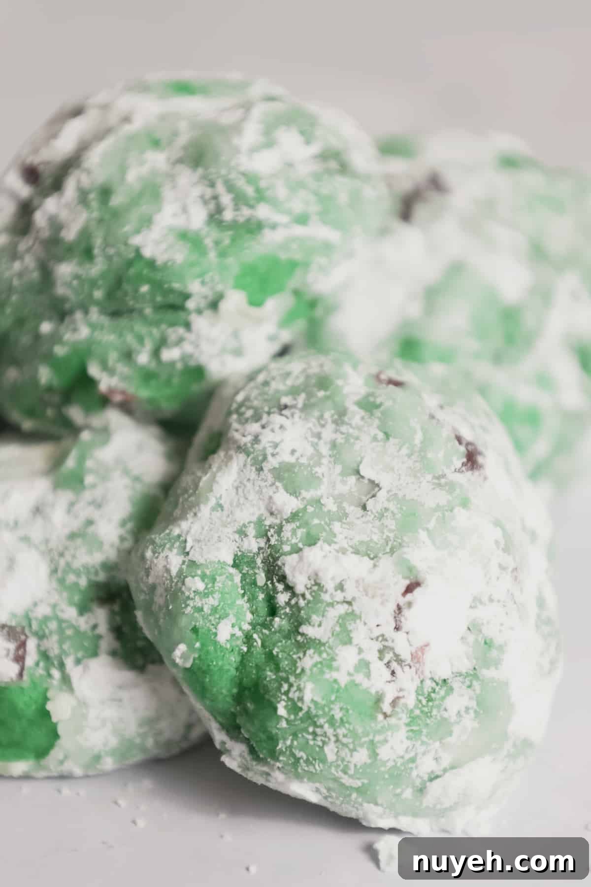 Pistachio cherry cookies on a platter.