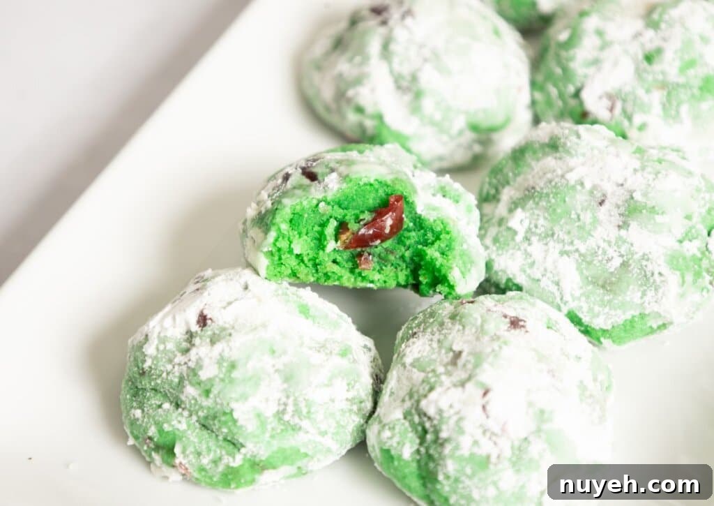 Pistachio cherry cookies on a platter.