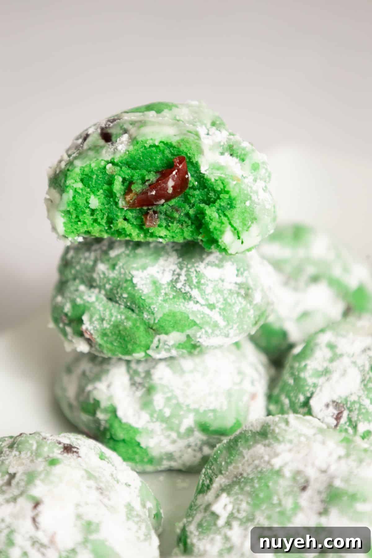 Pistachio cherry cookies on a platter.