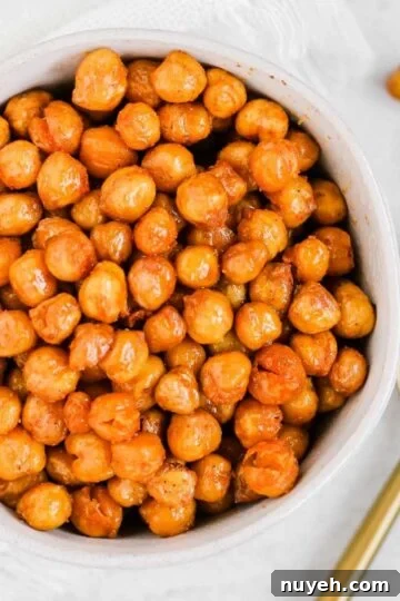Small bowl filled with roasted chickpeas.