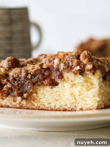 Sourdough apple coffee cake on a plate.