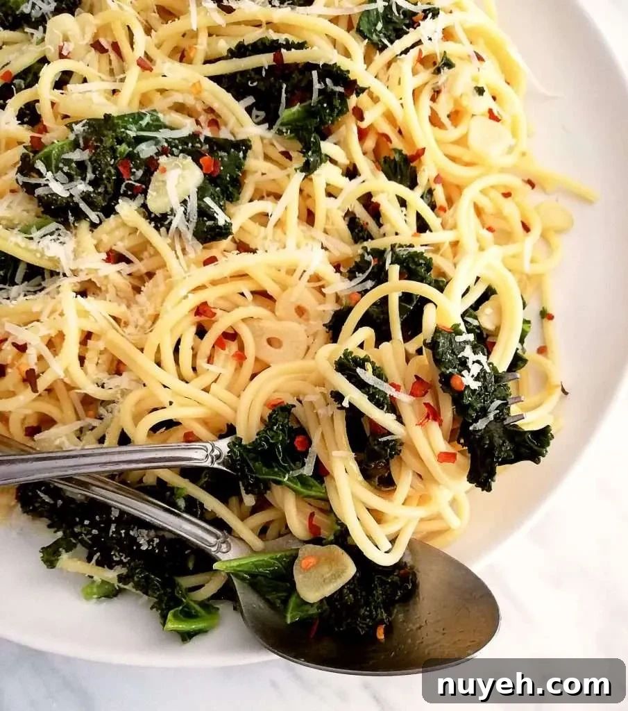 spicy kale pasta on fork close up
