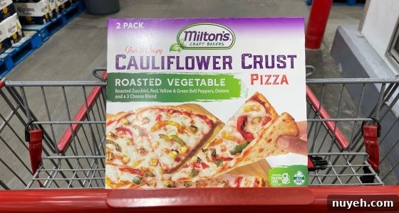Milton’s Cauliflower Pizza from Costco cut into appetizer squares — gluten-free Costco Thanksgiving food.