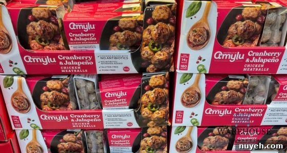 Amylu Cranberry Jalapeño Chicken Meatballs from Costco on a platter — sweet and spicy Costco Thanksgiving appetizer.