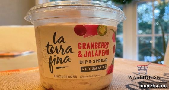 La Terra Fina Cranberry and Jalapeño Dip from Costco with crackers and veggies — creamy Costco Thanksgiving dip.