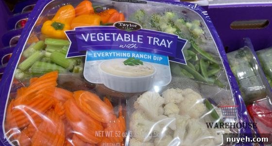 Taylor Farms Vegetable Tray from Costco with fresh broccoli, peppers, and dip — healthy Costco Thanksgiving appetizer.