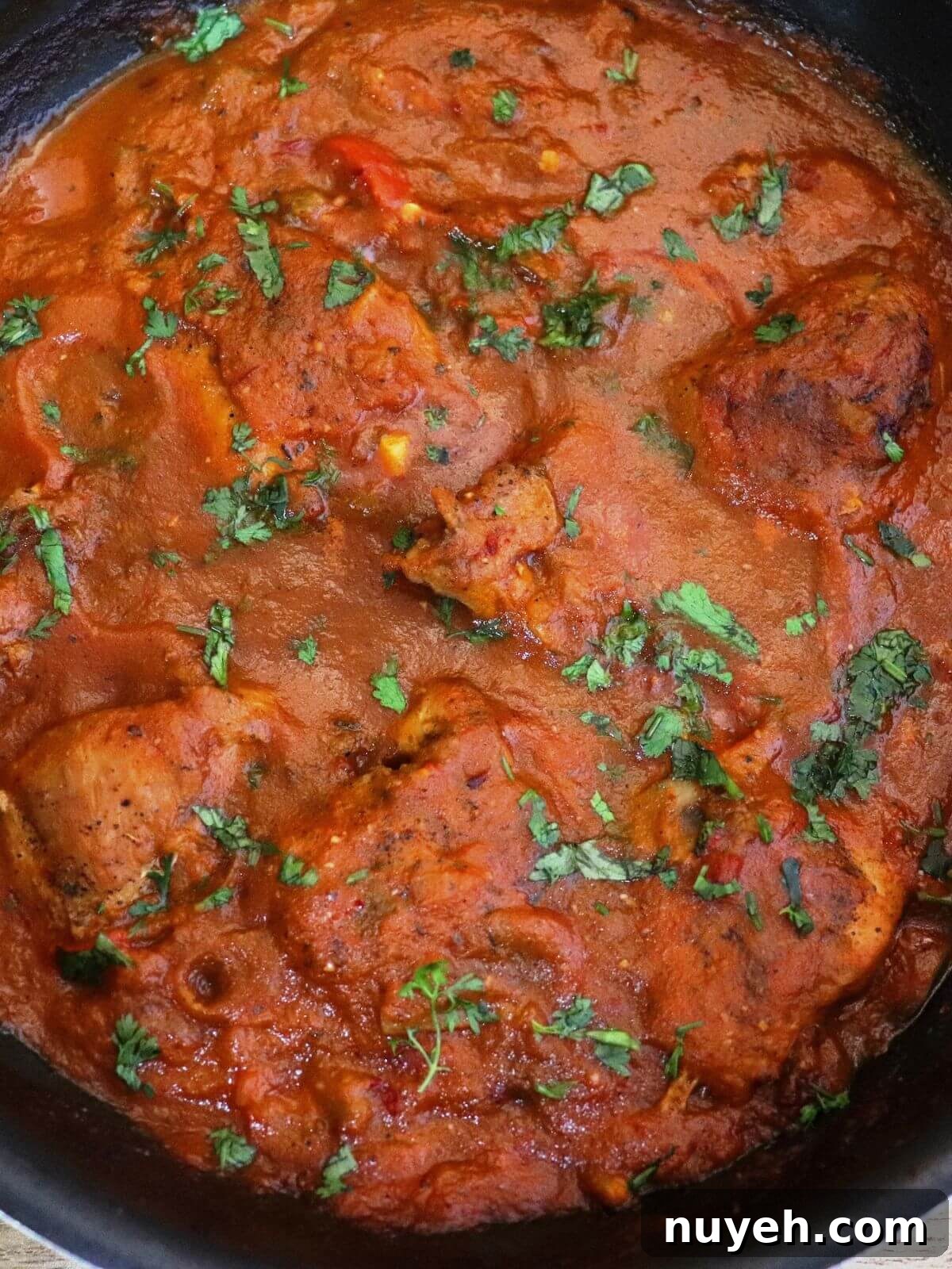 close-up of chicken cacciatore in a pot.