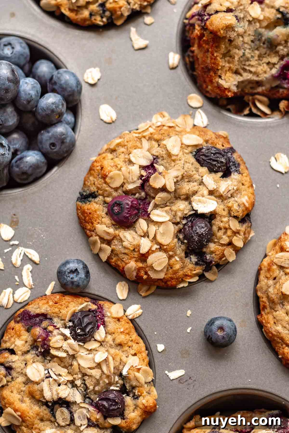 Banana blueberry muffins a muffin pan.