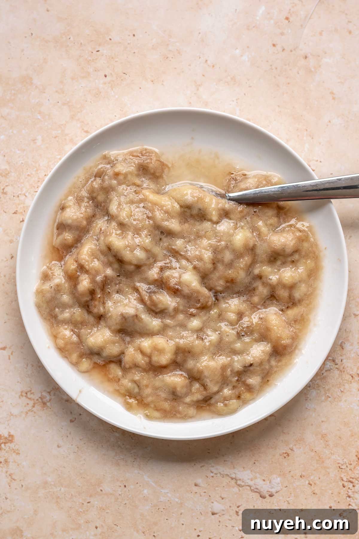 Mashed bananas on a plate.