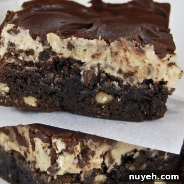 Cookie Dough Brownies stack on top of each other