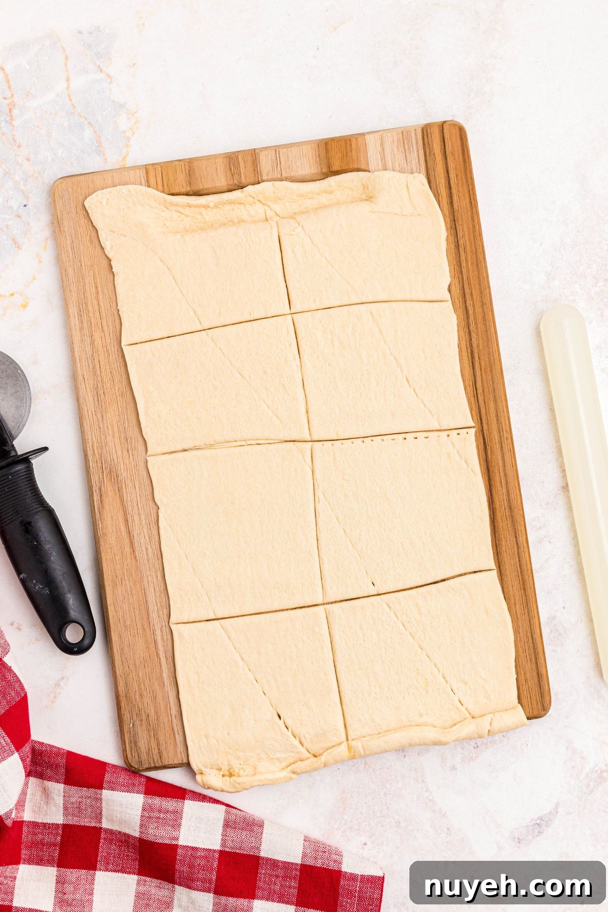 Pizza Cupcakes Recipe: Savory Mini Pizza Bites 4 Crescent dough rolled out and cut into 8 squares.