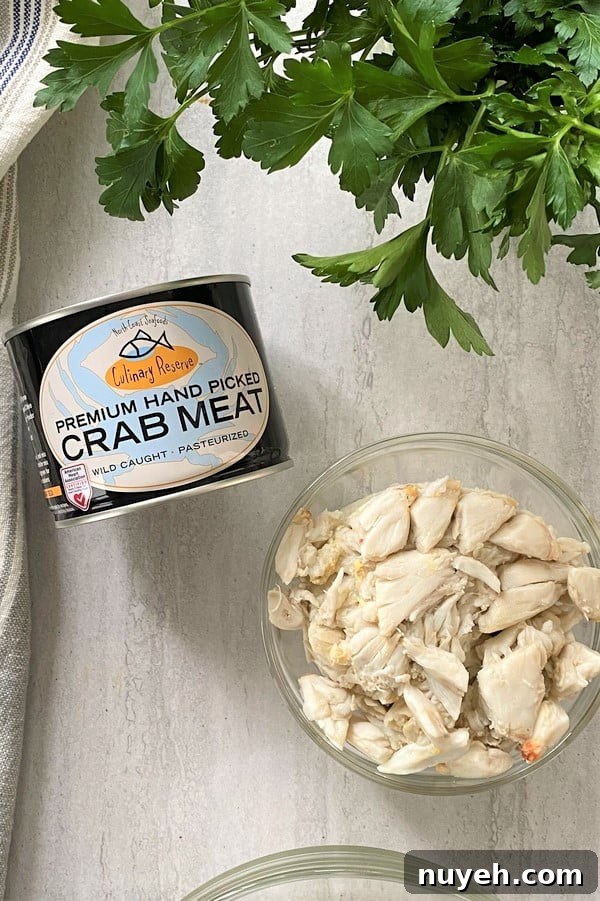 can of crab meat and a bowl of crab meat.