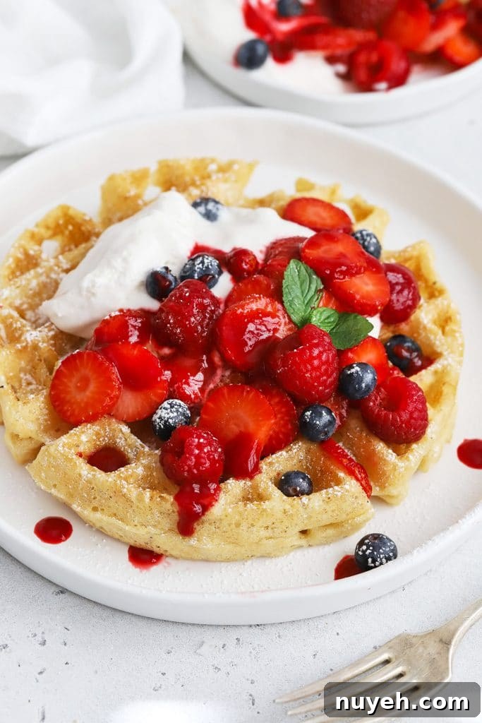 Gluten-free Belgian waffles topped with berries
