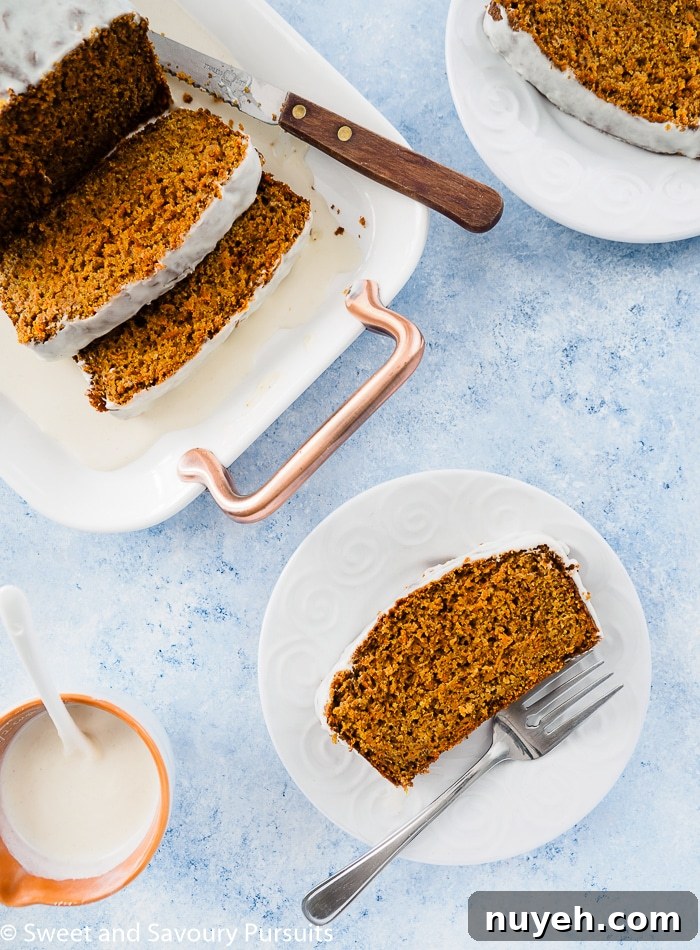 Moist Carrot Bread Recipe 2 Top view of a Healthy Carrot Bread sliced and served on a small dish.