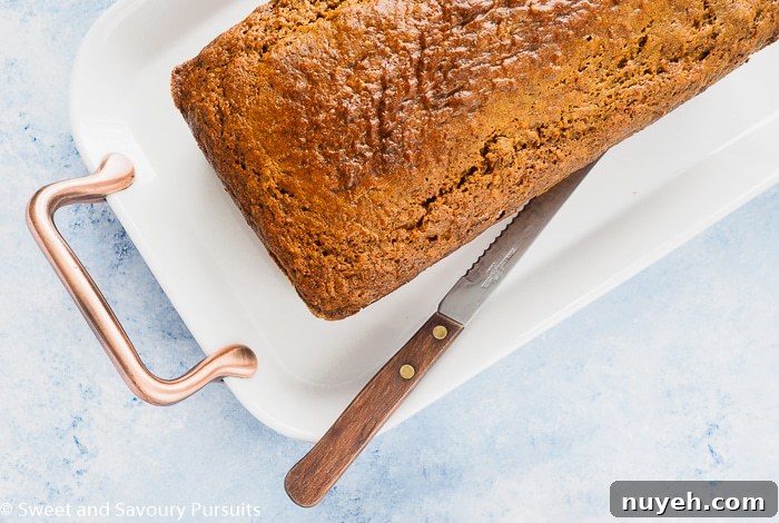 Moist Carrot Bread Recipe 3 Healthy carrot bread served on a white platter.