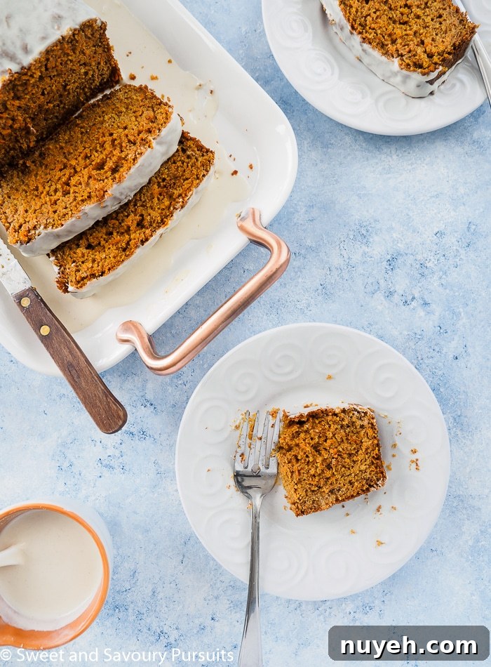 Moist Carrot Bread Recipe 5 A dish with a partially eaten slice of carrot bread.