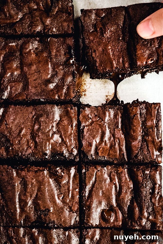 Fudgy homemade brownies with shiny crackly tops