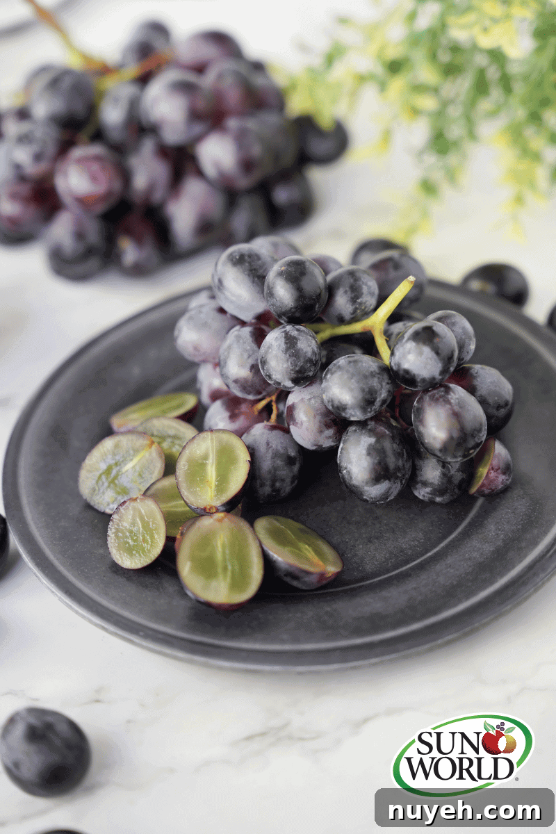 Sun World Black Grapes on plate