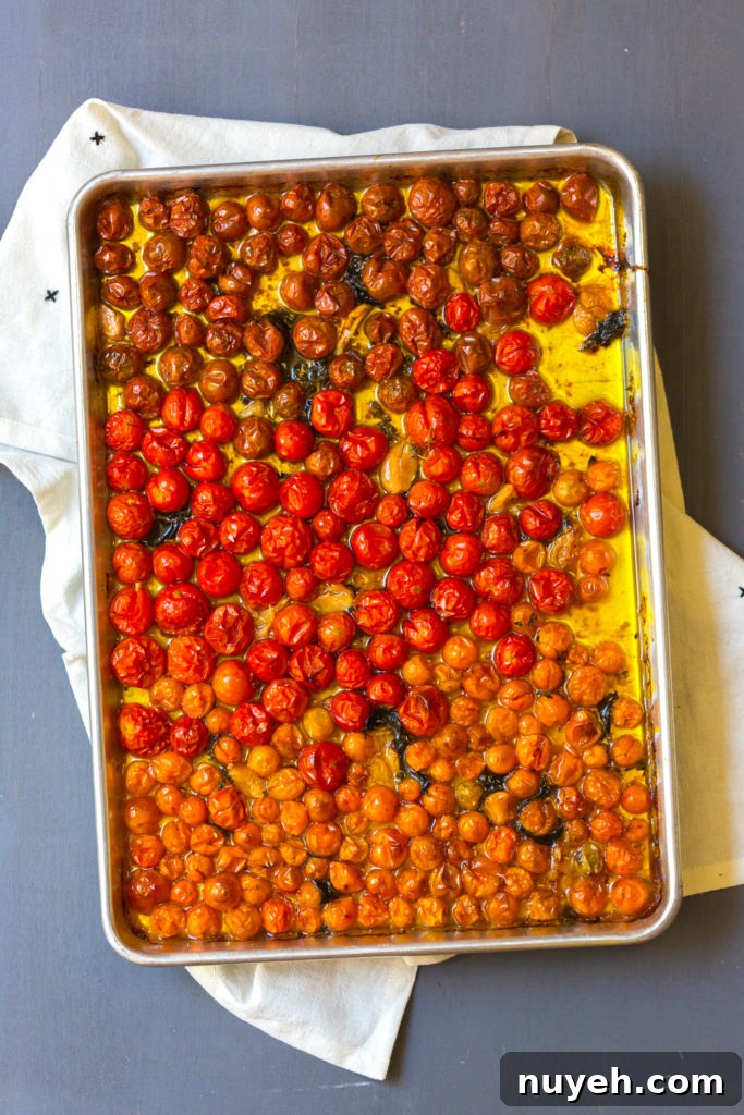 Roasted cherry tomatoes in olive oil with herbs
