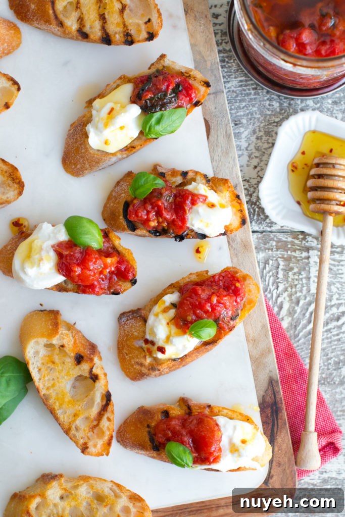 Tomato Confit & Burrata Crostini