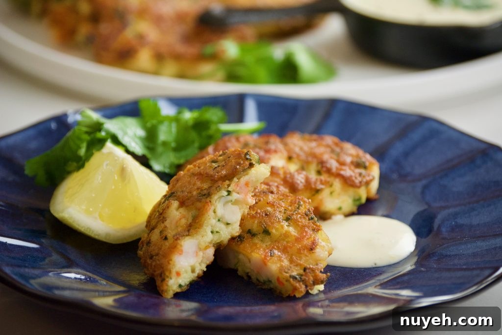 Crispy shrimp fritters served with sauce