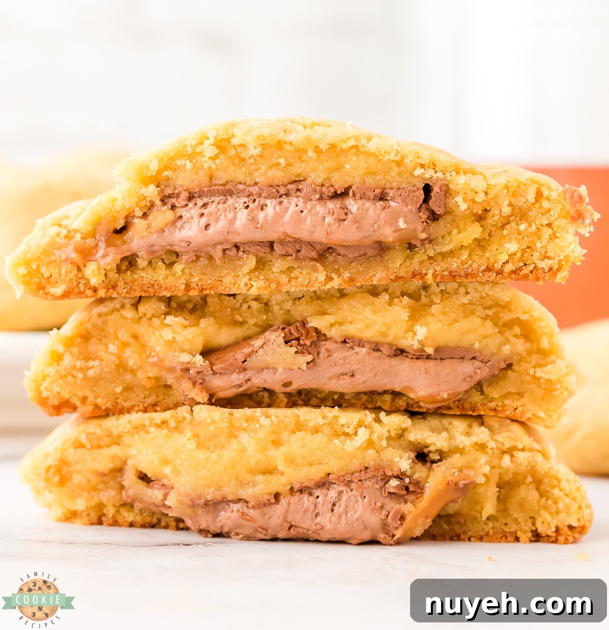 milky way stuffed cookies cut in half