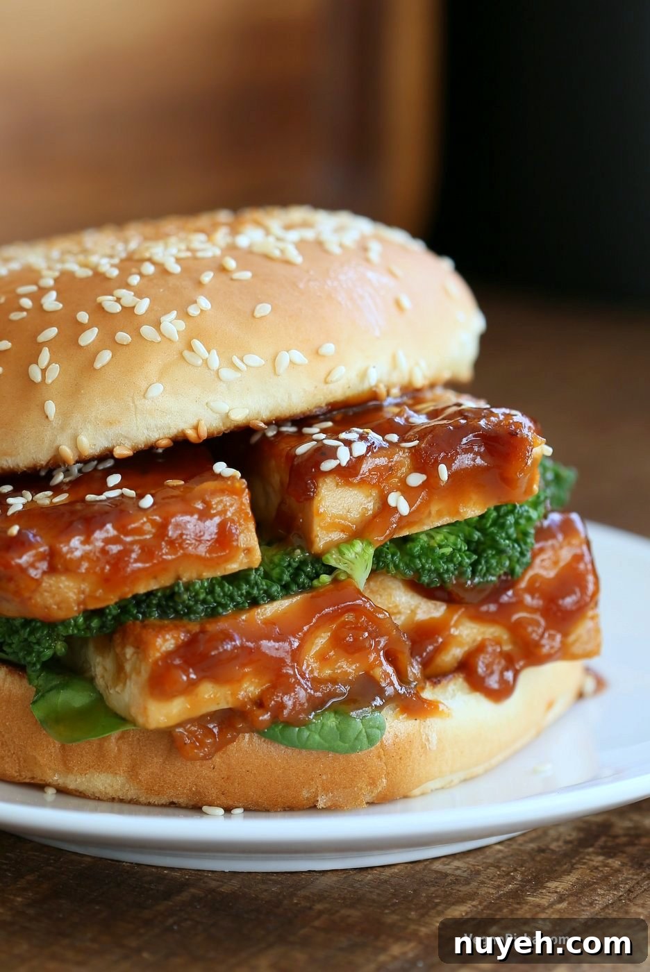 Side view of General Tso's Tofu Sandwich showing layers.