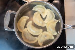 Authentic Polish Sauerkraut and Mushroom Pierogi Recipe 19 Boiling the pierogi