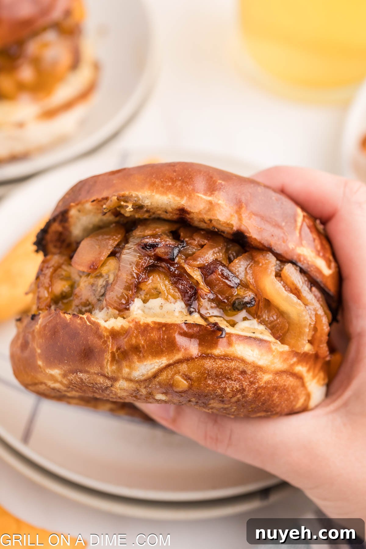 pub burger being held