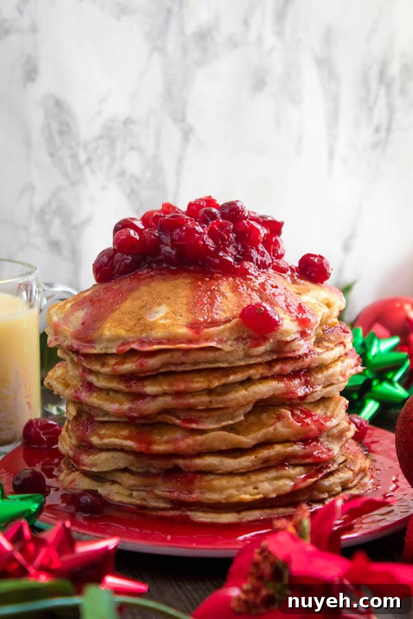 Festive Eggnog Pancakes with Cranberry Syrup Recipe 2 Eggnog Pancakes with cranberry syrup