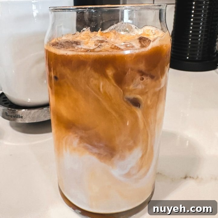 Iced Protein Vanilla Macchiato, a protein shake and coffee made with Nespresso Bianco Doppio and Fairlife Vanilla Power Core milk.