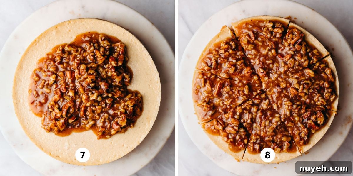 Adding pecan pie topping to a cooled cheesecake on a white marbled cake stand on a white background.