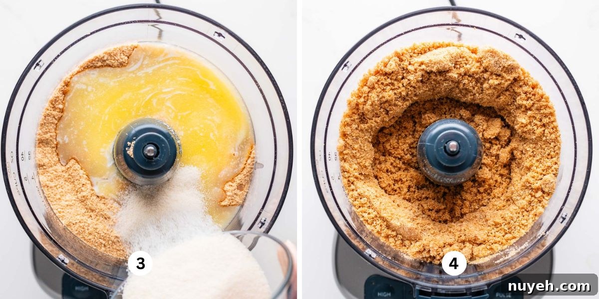 Adding melted butter and granulated sugar to graham cracker crumbs in a food processor on a white background.