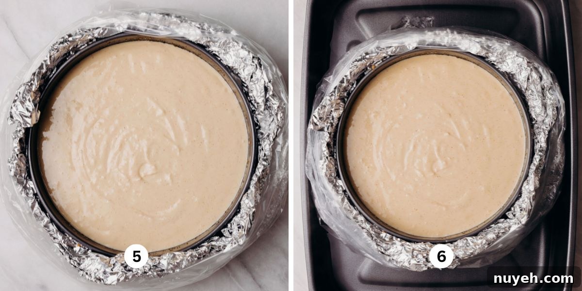 Transferring cheesecake batter to a prepared springform pan then transferring it to a large roasting pan.
