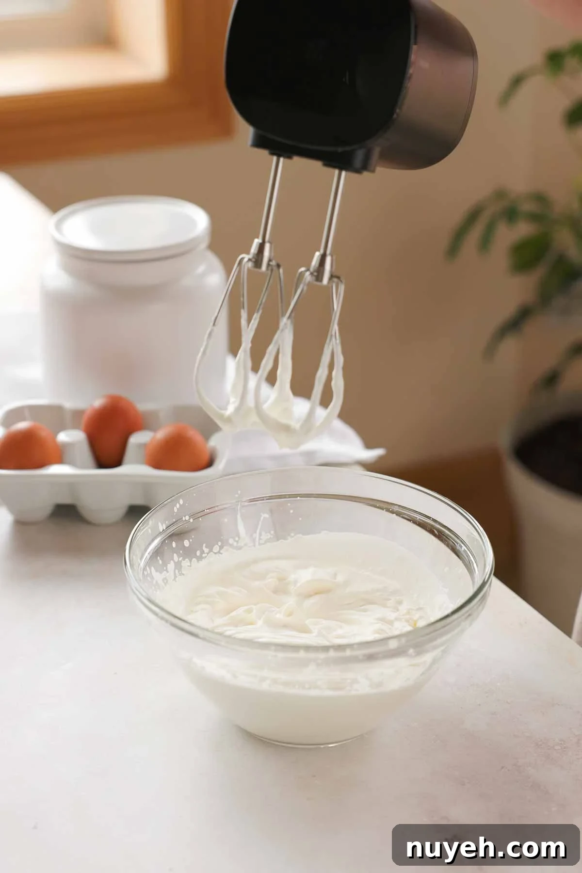 cream whipped to stiff peaks