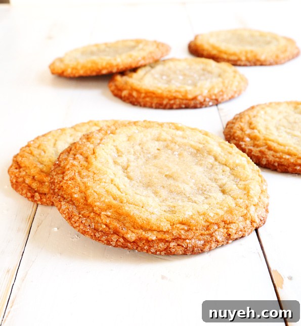 A close up of sugar cookies on white surface