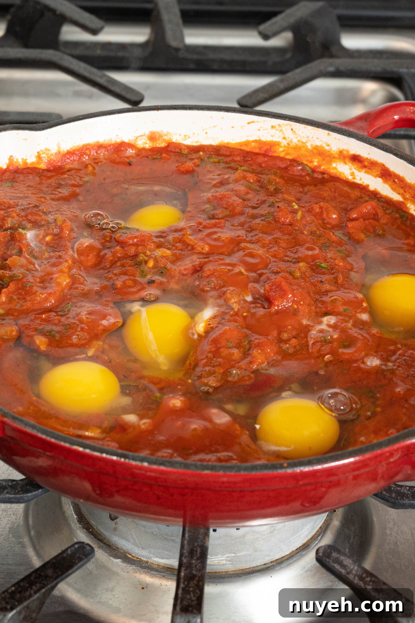 eggs in tomato sauce in a pan