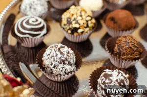 Different types of Milk chocolate truffles on a silver serving tray