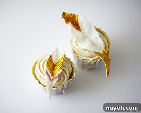 How to Make Cupcakes with Edible Gold Feathers 11 DIY Gold Feather Cupcakes | a cake tutorial by Cakegirls for TheCakeBlog.com