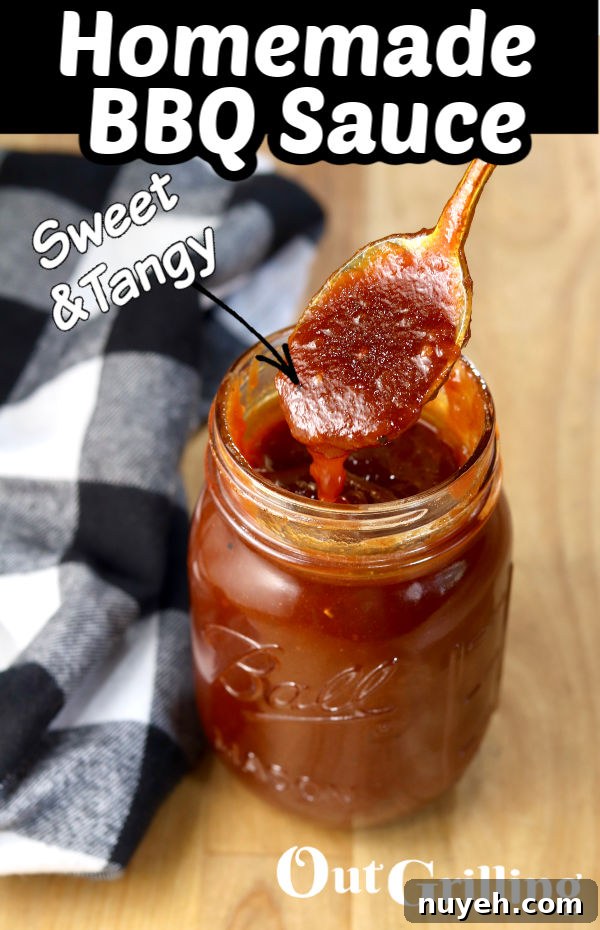 Homemade BBQ Sauce with spoon dipping into the jar