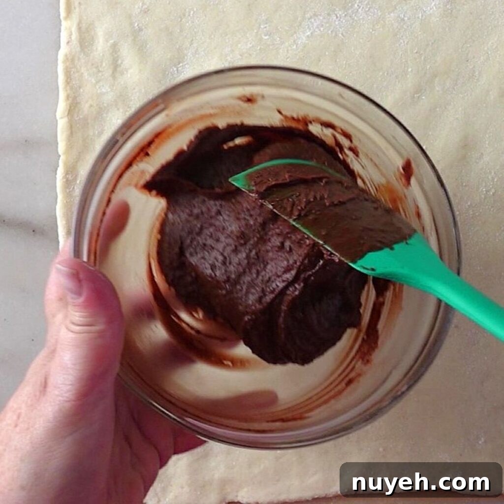 thickened chocolate filling in small glass bowl.
