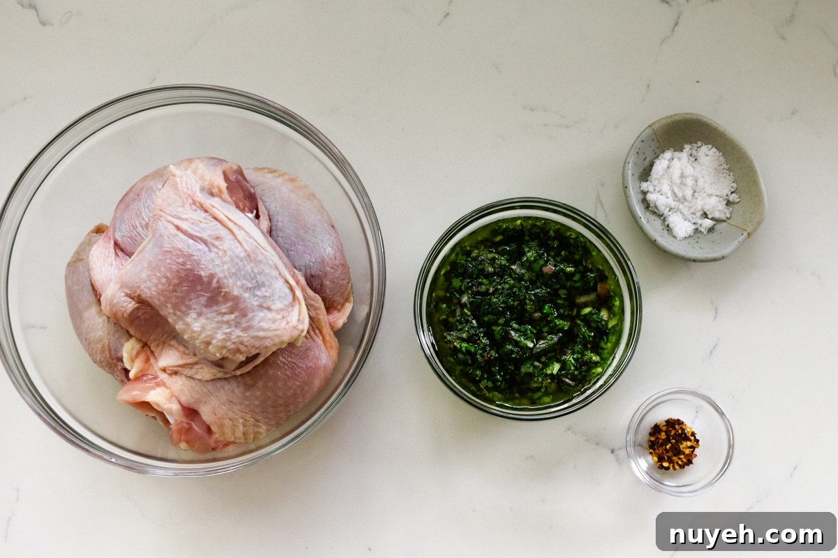 Grilled Chimichurri Chicken Thighs Recipe 4 chimichurri ingredients in glass bowls,