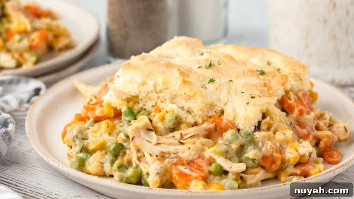 11 Comfort Food Recipes That Will Make You Ditch Your Diet 4 Chicken Pot Pie Casserole served on a plate.