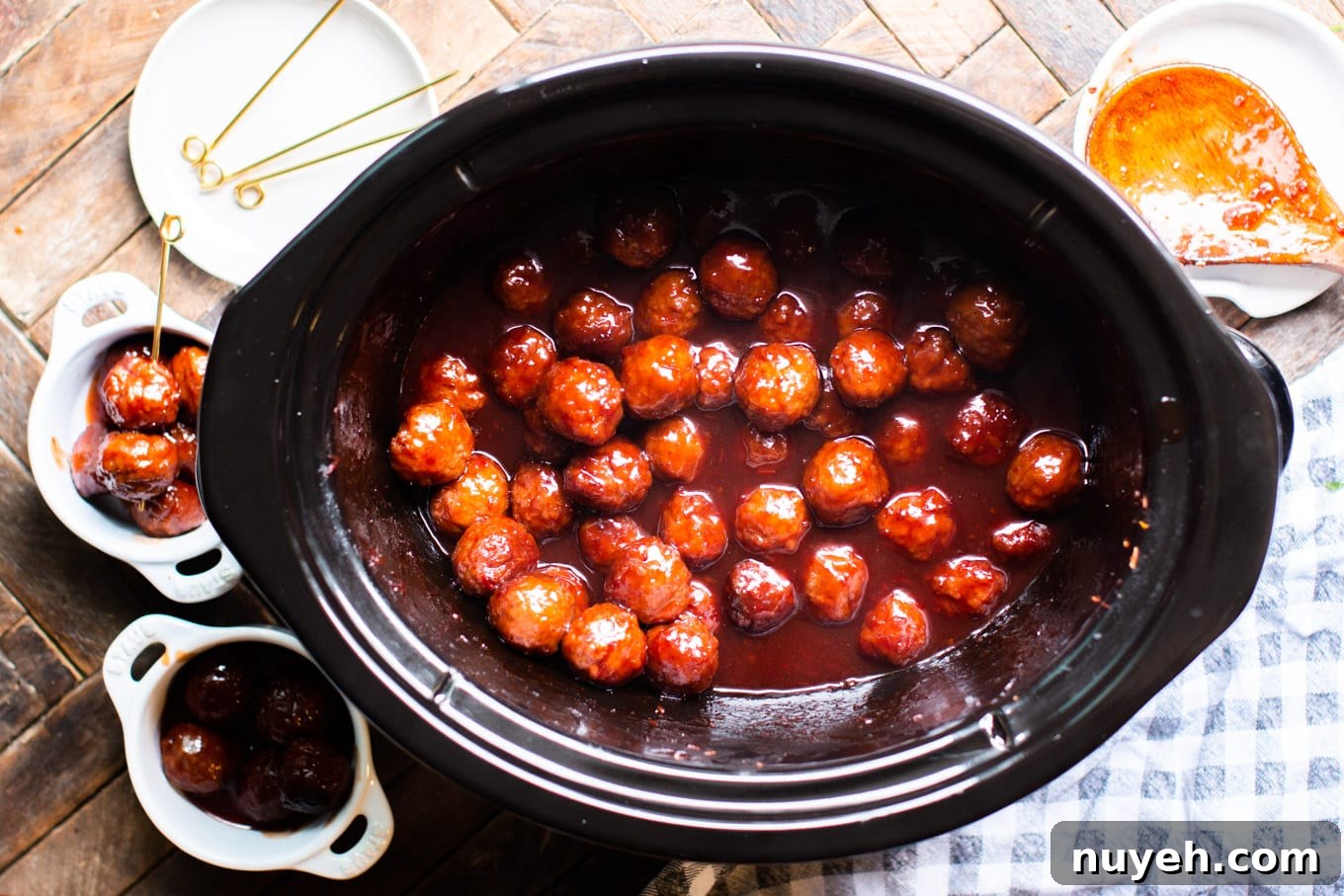 finished meatballs in grape jelly and chili sauce