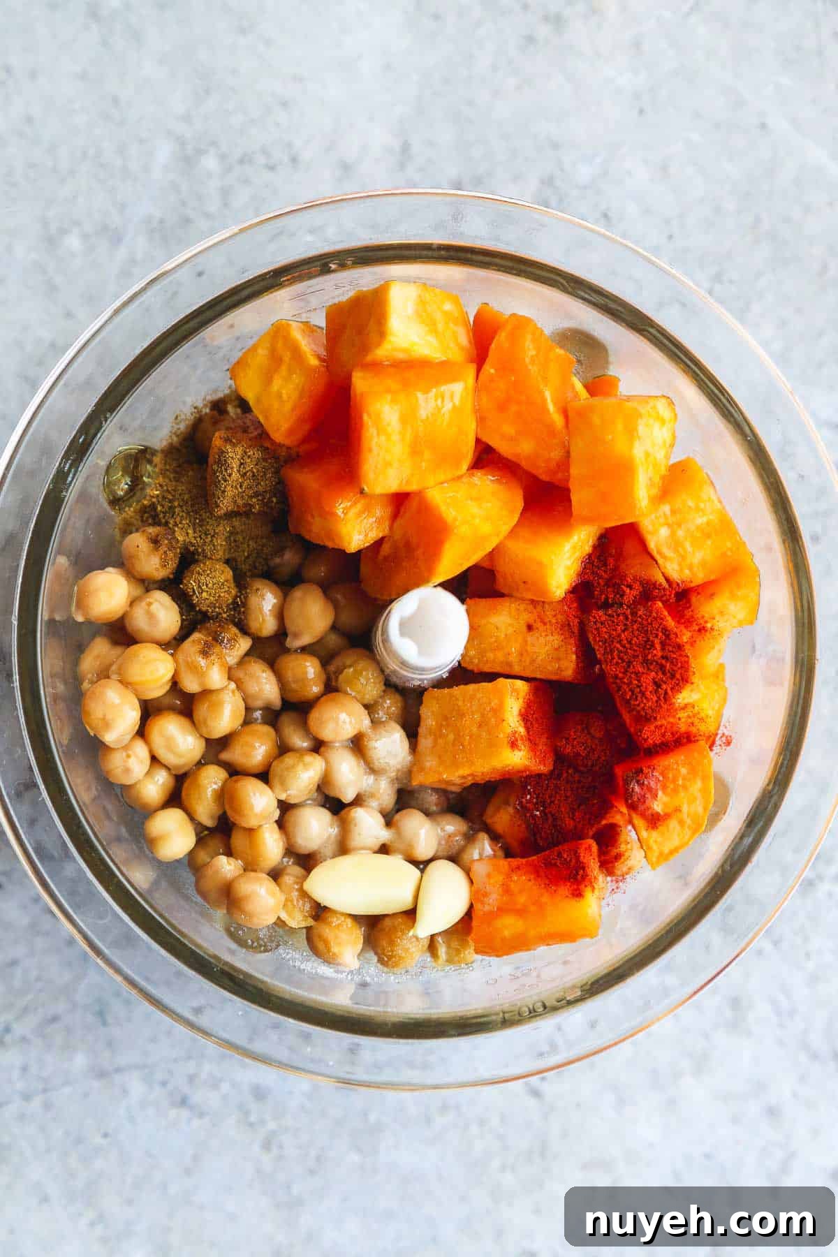 Sweet potato hummus ingredients in a food processor