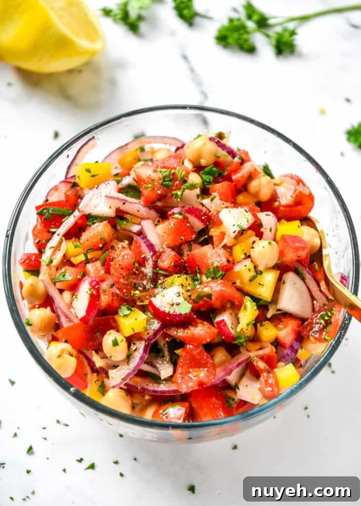 make-ahead vegan chickpea salad in a glass bowl.
