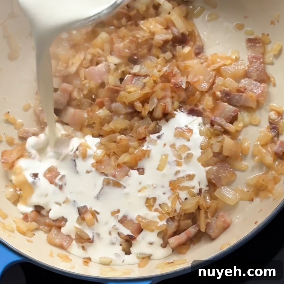 Classic Creamy Carbonara Recipe with Pancetta 5 Add in the heavy cream