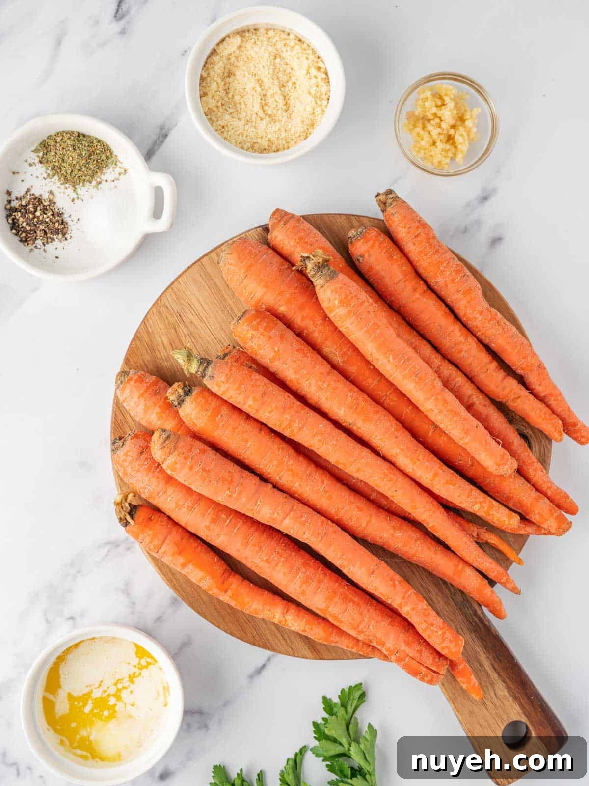 Ingredients needed for parmesan roasted glazed carrots.