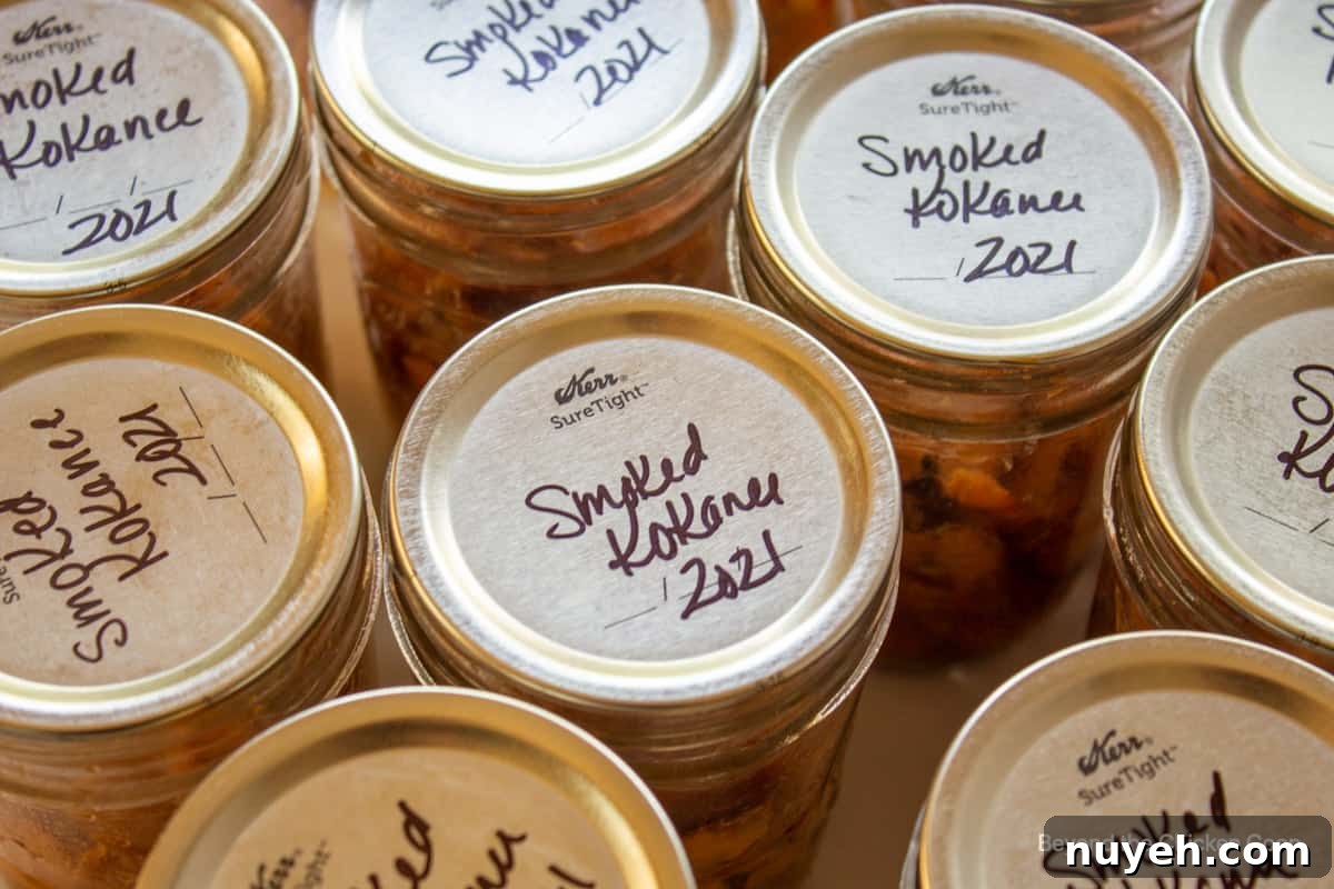 Jars of smoked kokanee with name and date.